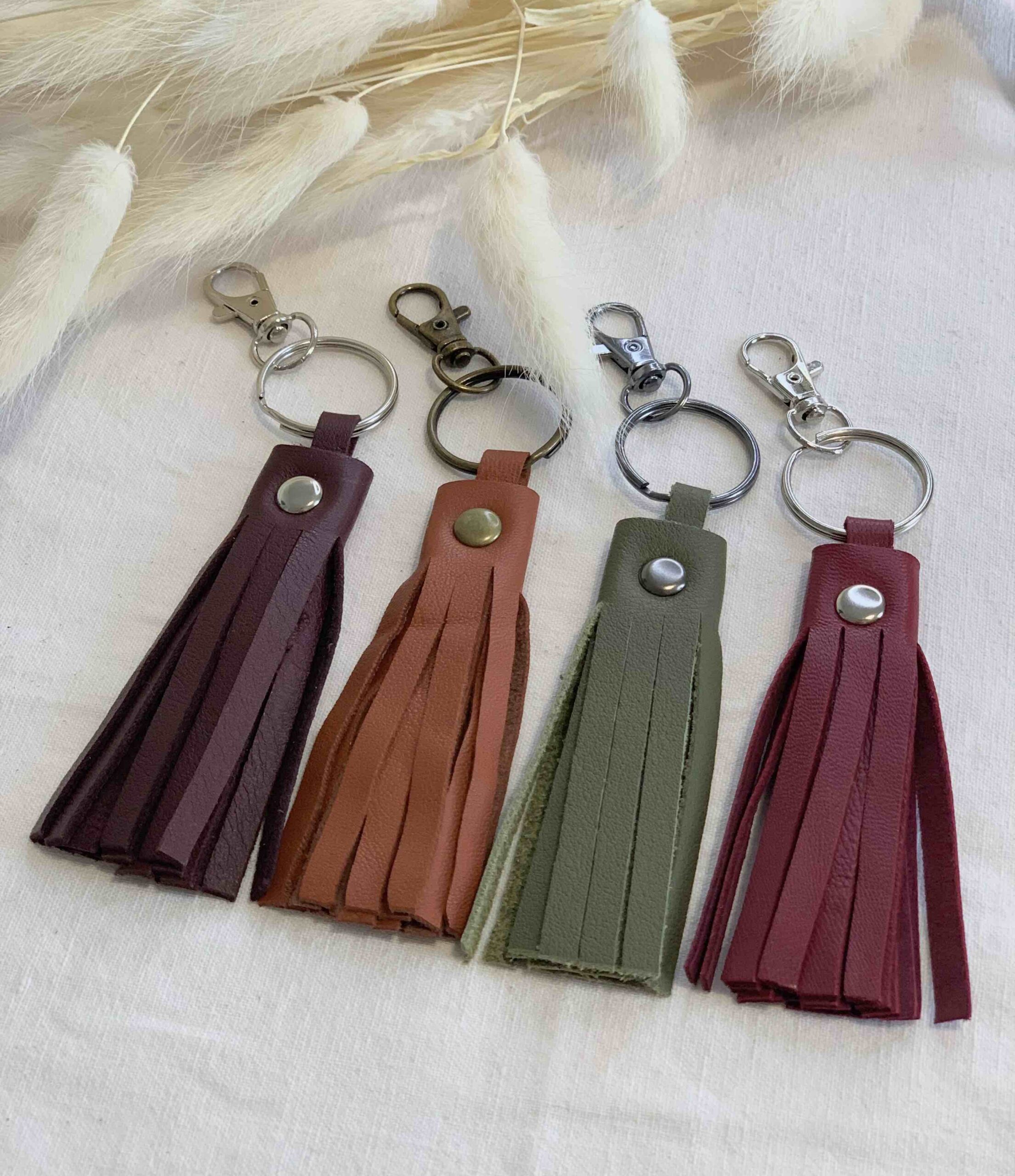 Porte-clés / Bijou de sac avec pompon en cuir